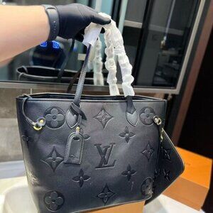 Louis Vuitton Embossed Shopping Bag Handbag